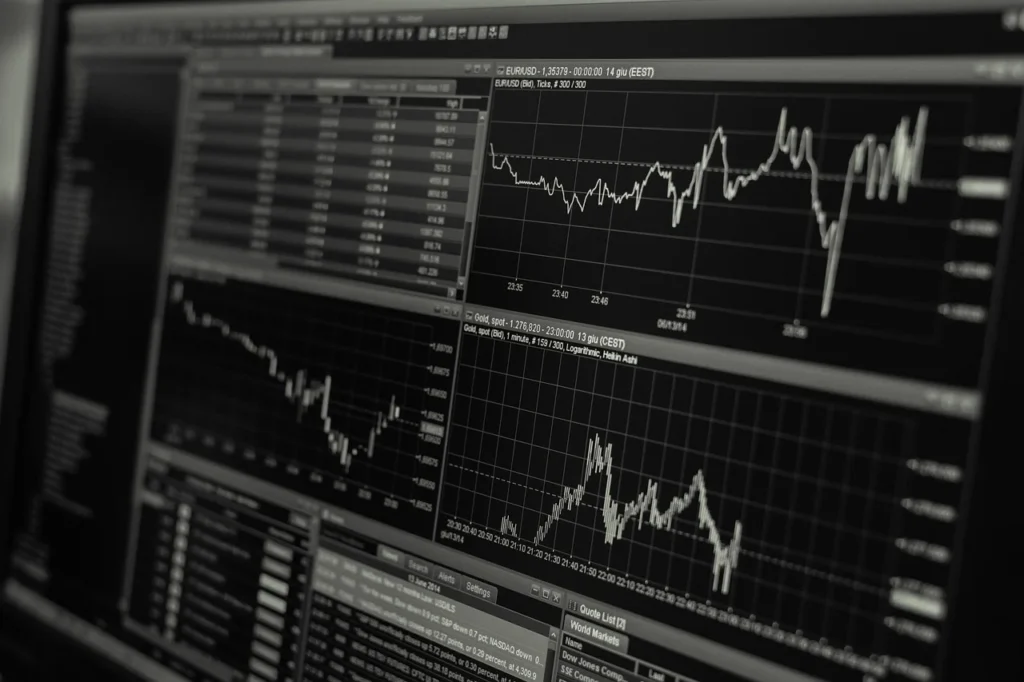 A computer screen showing diverse financial data, including graphs, charts, and numerical figures for analysis.